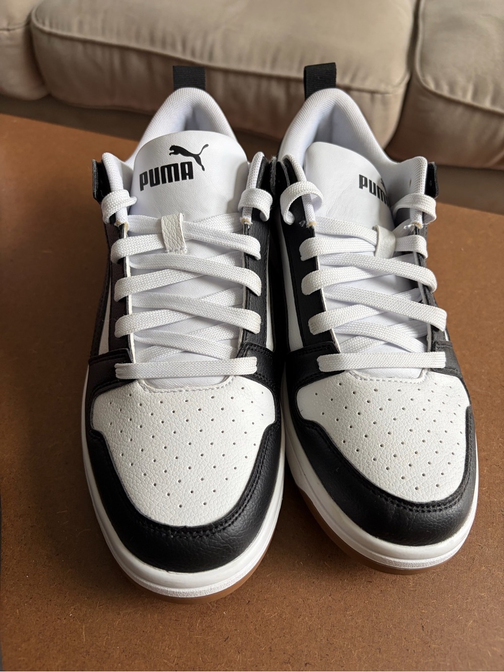 Puma Black and White Low-Profile Sneakers